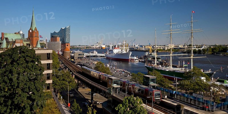 View of Hamburg harbour with museum ship Cap San Diego, elevated railway along the Elbe promenade and Elbphilharmonie concert hall, Germany
