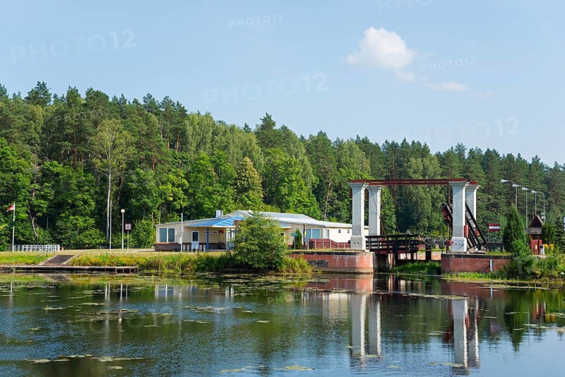 Landscape with lock and bridge, surrounded by forests and water, Sluza Kurzyniec, Sluza, lock, border between Belarus on the left and Poland on the right, Kanal Augustowski, Augustow Canal, Rudawka, Plaska, Plaska, Powiat Augustowski, Podlaskie, Podlaskie, Poland