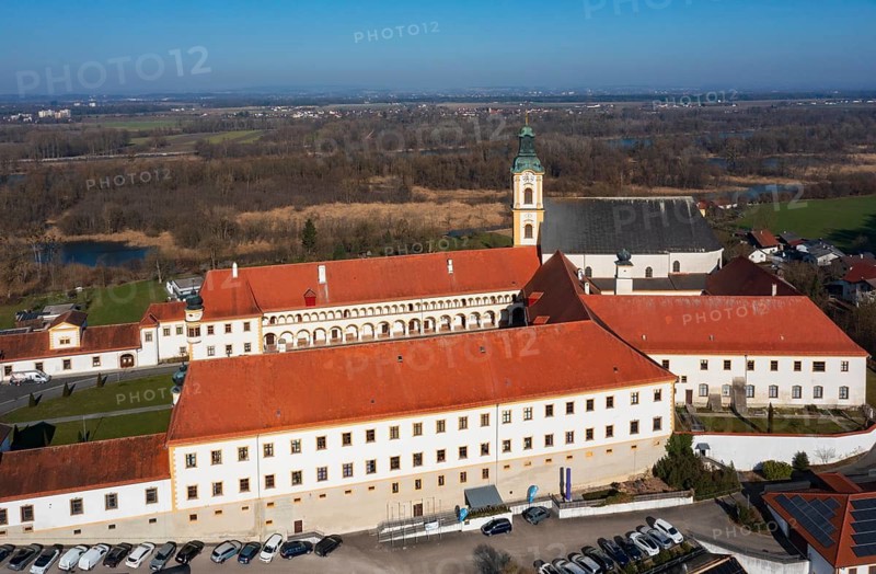 Drone shot, view of the village with Augustinian monastery Reichersberg, Reichersberg, Innviertel. Upper Austria, Austria