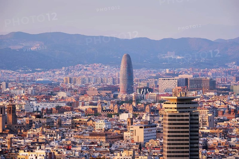 BARCELONA, SPAIN, APRIL 15, 2019: View of Barcelona city cityscape skyline on sunset. Barcelona, Spain
