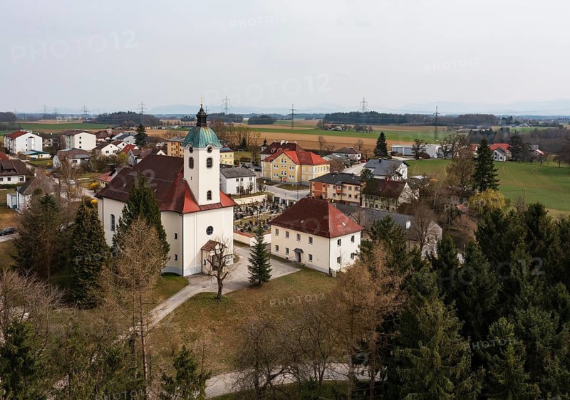 Drone shot, view of village, parish church, Schiedlberg Traunviertel, Upper Austria, Austria
