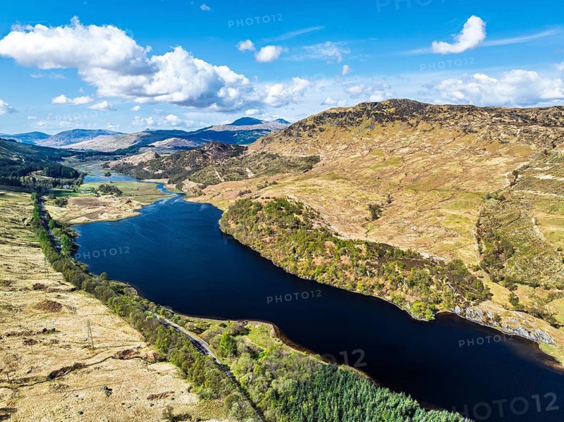 Mountains over Loch Iubhair from a drone, Crianlarich, Highlands, Scotland, United Kingdom