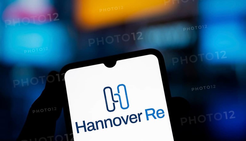 Hannover re logo is displayed on smartphone.Hannover Re is a reinsurance company
