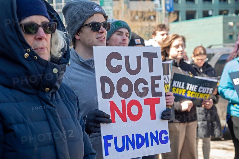 Detroit, Michigan USA - 8 April 2025 - Labor unions hold a 'Kill the Cuts' rally at Wayne State University, protesting Trump administration cuts to research, health care, and higher education. It was one of a many coordinated rallies across the United States