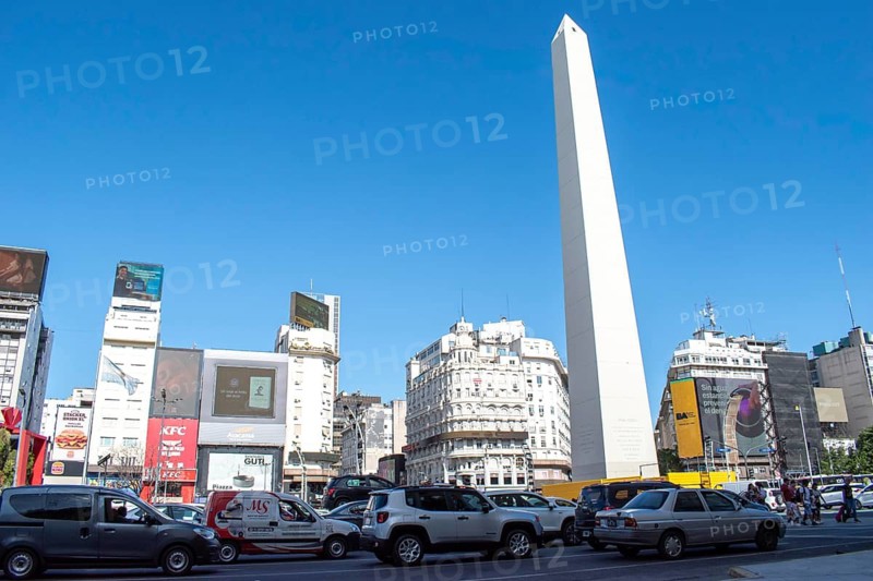Rush hour on Avenida 9 de Julio with the obelisk, the symbol of Buenos Aires, Argentina