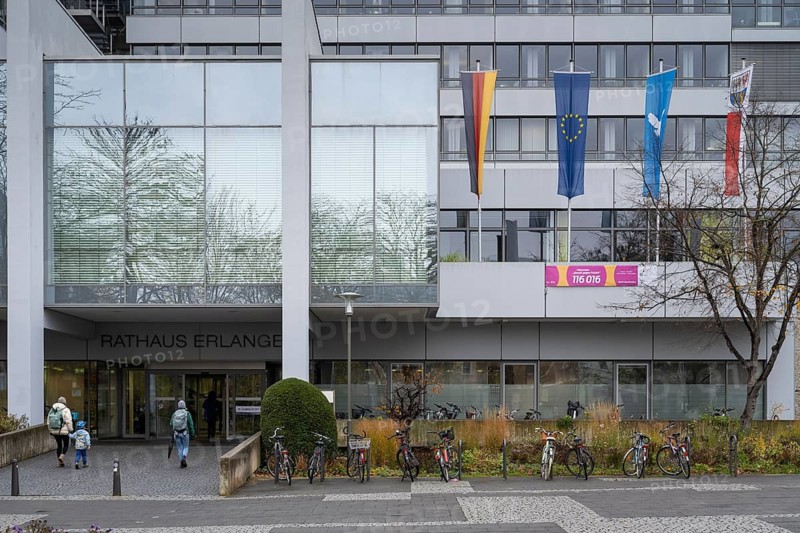 Entrance to the town hall, flags in front of the facade, Erlangen, Middle Franconia, Bavaria, Germany