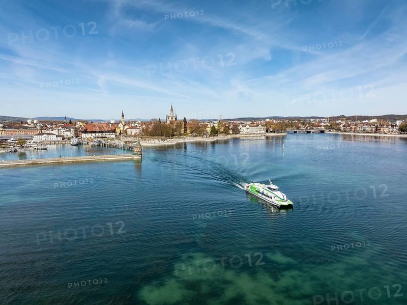 Aerial view of the harbour exit of Constance with the Lake Constance catamaran Fridolin from Lake Constance Schiffsbetriebe, which connects the cities of Constance and Friedrichshafen every hour all year round, passenger transport, shipping, Lake Constance, Constance district, Baden-Württemberg, Germany