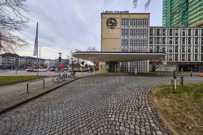 Continental Tower, architects Werner Dierschke and Ernst Zinsser, Gottfried Wilhelm Leibniz Universität Hannover, listed building, entrance area, roofing, 1950s, access road, cobblestones, diffuse light, pale blue cloudy sky, slightly sunny, Brühlstraße, Hanover, state capital, Hanover region, Lower Saxony, Germany