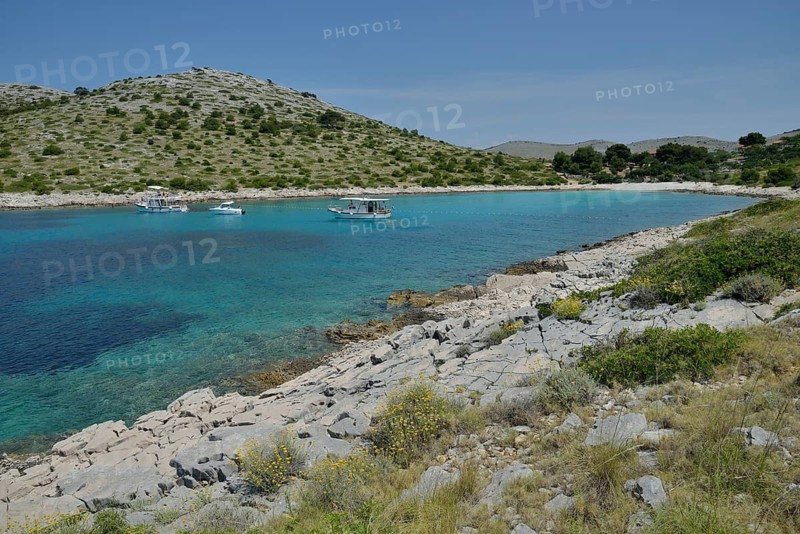 Excursion boats in Lojena Bay, Levrnaka Island, Kornati islands, Kornati National Park, Adriatic, Croatia