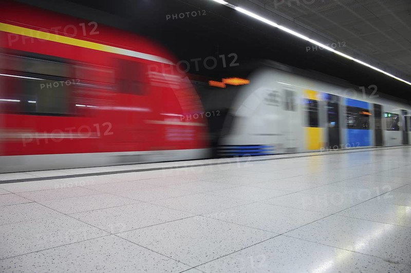 Underground arriving S-Bahn, train, class 420 in traffic red, coupled with Generation 2025, platform, stop, city centre station, public transport, movement effect, Stuttgart, Baden-Württemberg, Germany