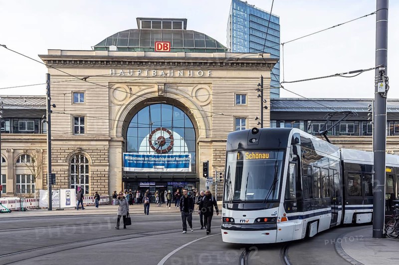 Main station, exterior view of the station building with RNV tram. Mannheim, Baden-Württemberg, Germany
