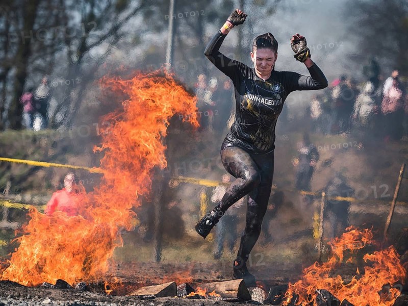 WROCLAW, POLAND - APRIL 7, 2018: Extreme running with obstacle RUNMAGEDDON. In the picture a runner on the Recruit route