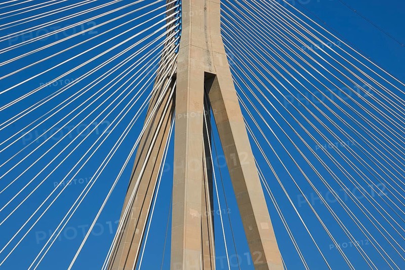 Detailed view of the steel cables of a bridge against a clear sky, Rio-Antirrio cable-stayed bridge, Patras, Peloponnese, Greece
