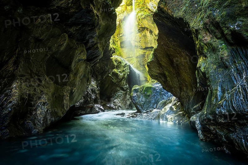 Waterfall in rocky gorge, Wilson Creek Chasm (Wilson Creek Canyon, Wilson's Creek), Haast Pass, near Wanaka, Otago, South Island, New Zealand