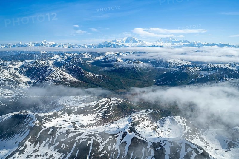 Clouds over high mountains, Mt Foraker and Mt Denali or Mount McKinley, aerial view, Alaska Range, Denali National Park, Alaska, USA