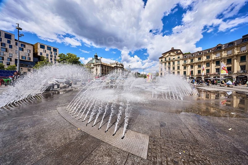 Fountain, general architecture, residential and commercial buildings, Stachus roundel, neo-baroque style, lantern, pedestrian zone, blue sky, cumulus clouds, Stachus, Karlsplatz, Munich, state capital, district-free city, Bavaria, Germany