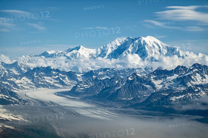 Clouds over high mountains, Mt Foraker with Kahlitna Glacier, aerial view, Alaska Range, Denali National Park, Alaska, USA