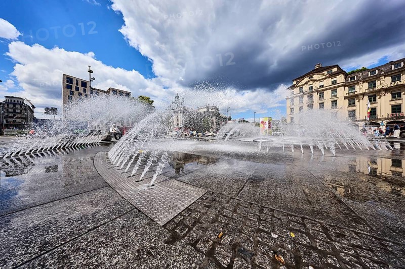 Fountain, water fountain, general architecture, residential and commercial buildings, stachus roundel, neo-baroque style, water, frozen movement, pedestrian zone, frog eye view, blue sky, white and dark gray cumulus clouds, Stachus, Karlsplatz, Munich, state capital, district-free city, Bavaria, Germany