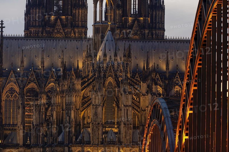 Evening atmosphere, Cologne Cathedral illuminated with LED lamps and the Hohenzollern Bridge, Cologne, North Rhine-Westphalia, Germany