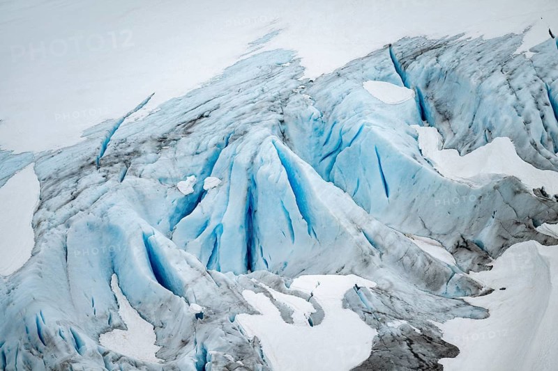 Blue rugged glacier ice with crevasses and snow, detail, Exit Glacier, Kenai Peninsula, Alaska, USA