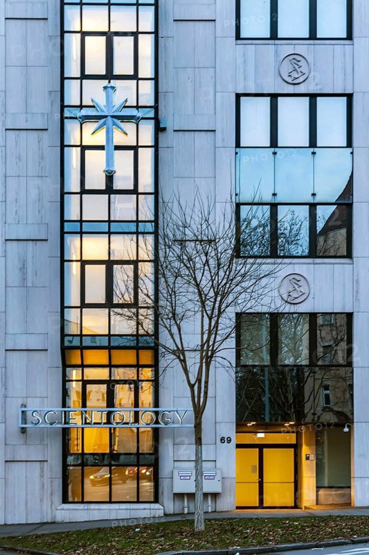 Scientology, headquarters of the sect, exterior view in the evening with Scientology cross. Stuttgart, Baden-Württemberg, Germany