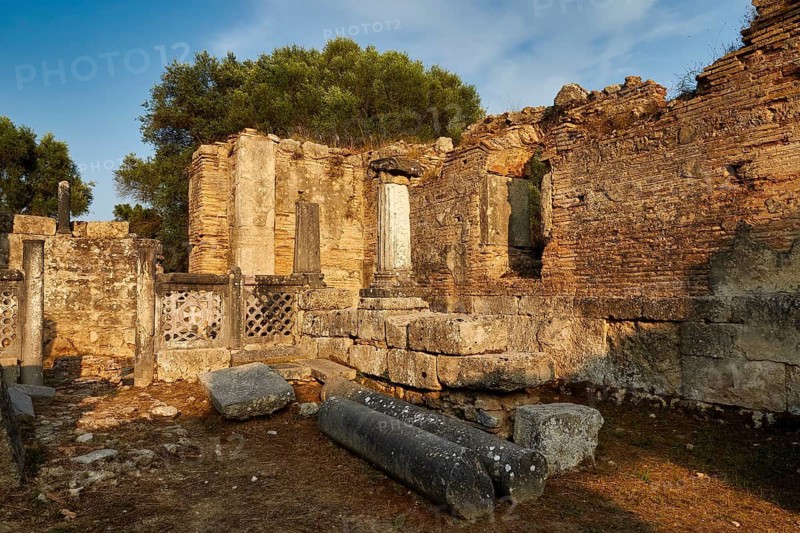 Phidias' workshop, remains of walls in reddish evening light with remains of columns, archaeological excavation site, Ancient Olympia, Olympia, Peloponnese, Greece