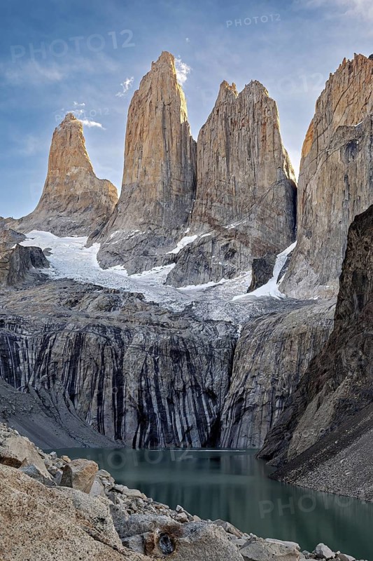 Majestic rocky peaks above a turquoise-coloured mountain lake, The rock towers of Torres del Paine in Patagonia Chile