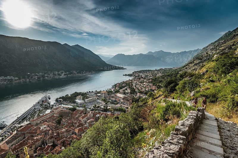 KOTOR, MONTENEGRO - JUNE 20, 2019: Tourists on the trail leading to the fortress on the hill.