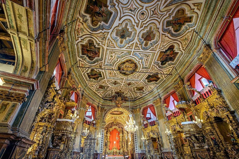Interior of a baroque cathedral adorned with gold in the city of Ouro Preto, Ouro Preto, Minas Gerais, Brazil