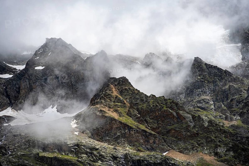 Cloudy mountain peaks, Bernese Alps, Bernese Oberland, Switzerland