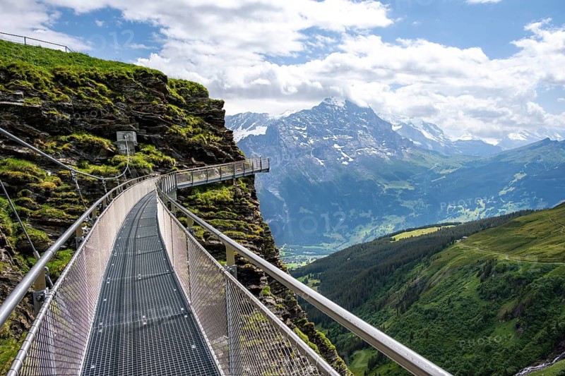 Tourist attraction First Cliff Walk, metal trail on a rocky outcrop, Grindelwald First, in front of impressive mountain scenery, Bernese Alps, Bernese Oberland, Switzerland