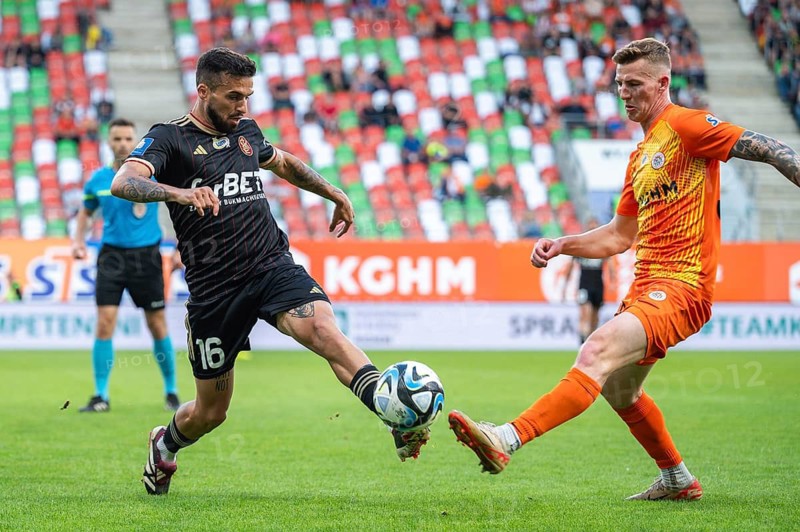 LUBIN, POLAND - MAY 20, 2024: Football match Polish PKO Ekstraklasa between KGHM Zaglebie Lubin vs LKS Lodz. In action Dani Ramirez (L) Dawid Kurminowski (R).