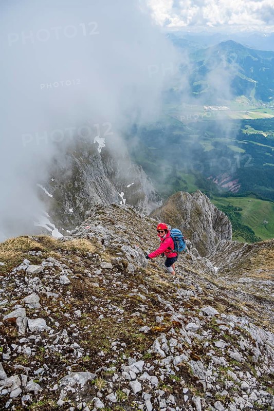 Mountaineer with helmet, ascent to the Ackerlspitze, Wilder Kaiser, Kaiser Mountains, Tyrol, Austria