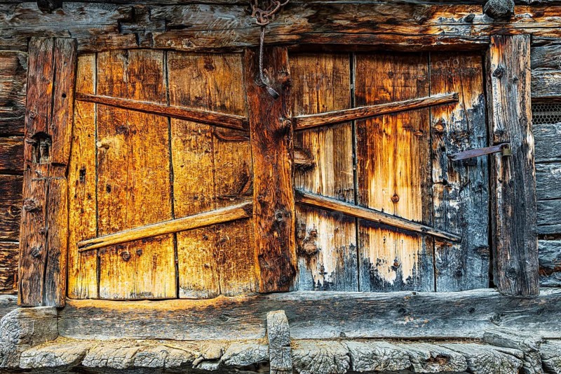 Loading door of an old, weathered Stadel warehouse, historic town center, Grimentz, Val d'Anniviers, Valais Alps, Canton of Valais, Switzerland