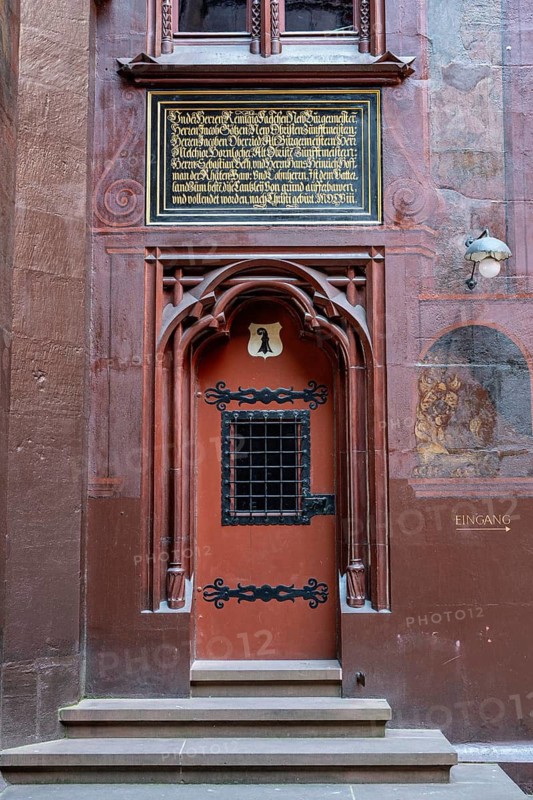 A distinctive door in the courtyard of Basel City Hall framed with late Gothic flooring and ornate tracery, Altstadt, Basel, Canton of Basel-Stadt, Switzerland
