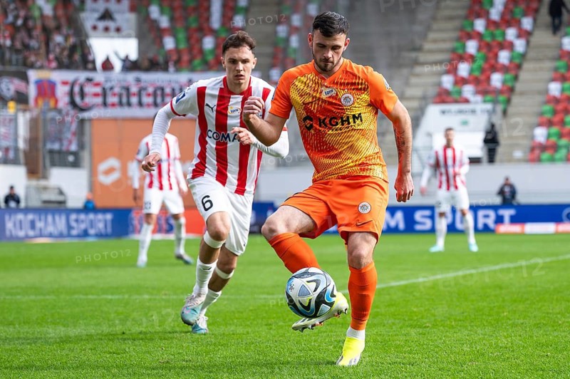 LUBIN, POLAND - FEBRUARY 18, 2024: Football match Polish PKO Ekstraklasa between KGHM Zaglebie Lubin vs Cracovia 1:1. In action Jani Atanasov (L) and Sergiy Buletsa (R)