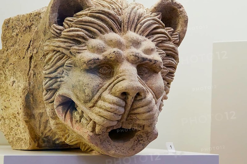 Ancient lion head gargoyle, gargoyle, A lion's head as stone relief shows ancient artistry and attention to detail, Olympia Archaeological Museum, Ancient Olympia, Olympia, Peloponnese, Greece