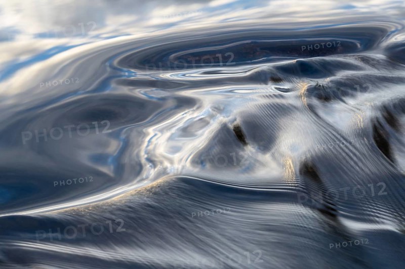 Waves in a stream, abstract, Norrbotten, Lapland, Sweden, August 2022