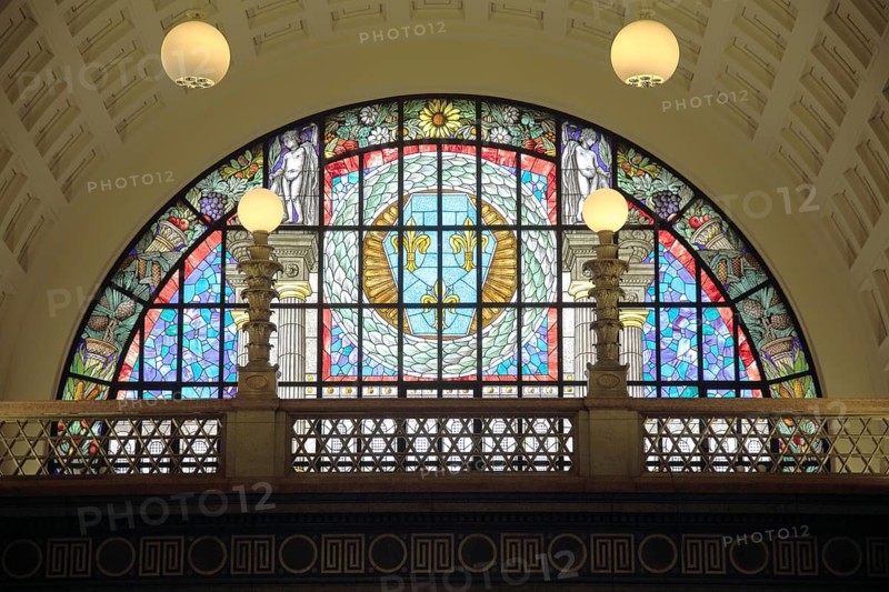 Colorful stained glass window with city coat of arms with laurel wreath, handicrafts, stained glass, interior view, spa hotel, Wiesbaden, Taunus, Hesse, Germany