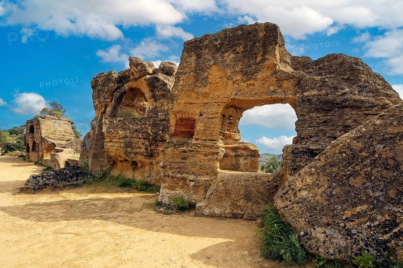 Relics of ancient rock tombs, Arcosol tombs (Arcosolia), Valley of the Temples, Valle dei Templi, near Agrigento, Sicily, Italy, Mediterranean Sea