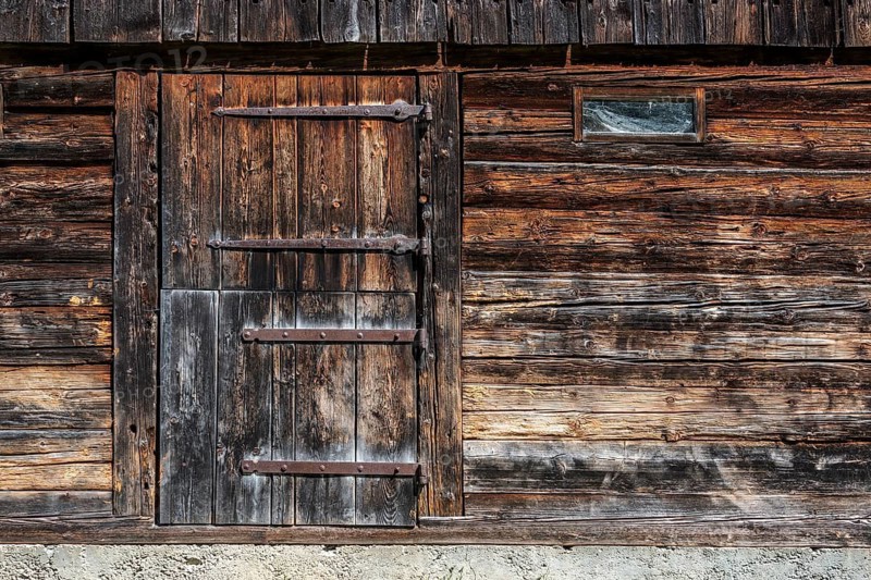 Old wooden door on an old wooden barn, Oberallgäu, Allgäu Alps, Allgäu, Bavaria, Germany