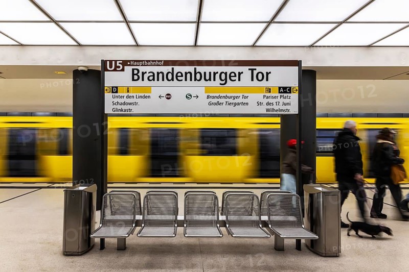 Brandenburg Gate subway station on line U5 with subway. Travelers on the platform. Berlin, Germany