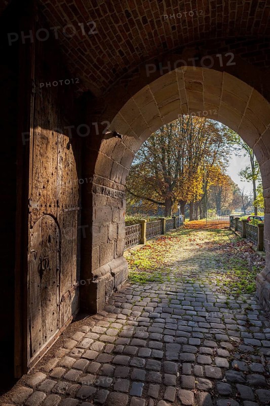 Old powerful entrance gate to Bladenhorst Castle in autumn, Castrop Rauxel, Ruhr area, North Rhine-Westphalia, Germany