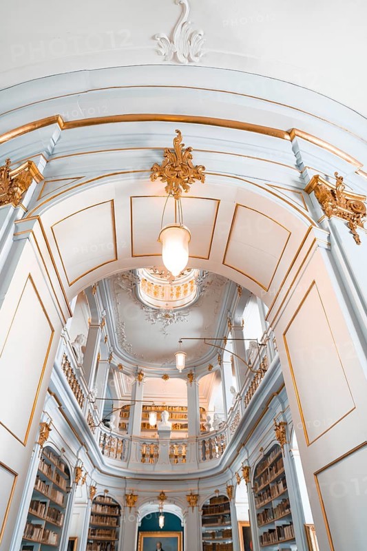 Elegant library architecture with elaborate ceiling and pendant lighting, Weimar, Germany
