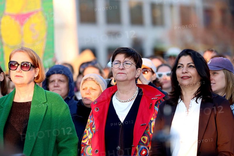 Politicians Lisa Paus (Alliance 90/The Greens), Saskia Esken (SPD) and Derya Türk-Nachbaur (SPD) stand in the front row at the demonstration Against sexualised digital violence - solidarity with all victims on Pariser Platz in Berlin on 22 March 2026