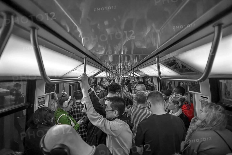 Full metro at rush hour, black and white, Paris, France