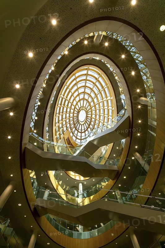 Soaring modern elliptical atrium in the Central Library building, city of Liverpool, England, UK