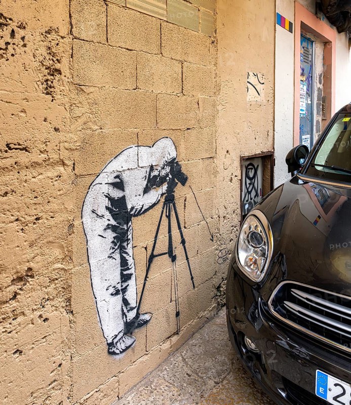 Artistic graffiti on a house wall in Carrer de Sant Pere, Palma de Majorca, Spain