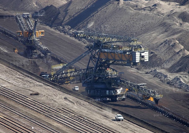 Welzow, Brandenburg, DEU, 07.07.2004 -Vattenfall Europe Mining & Generation bucket wheel excavators in the Welzow-Süd open-cast lignite mine in the evening