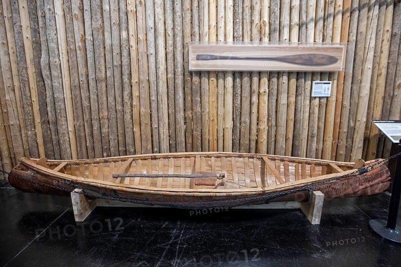 Monroe, Michigan - A birch bark canoe at the River Raisin National Battlefield Park. The park commemorates key battles in the War of 1812. The park's education center documents the lives of settlers and Native Americans who lived there in the early 1800s